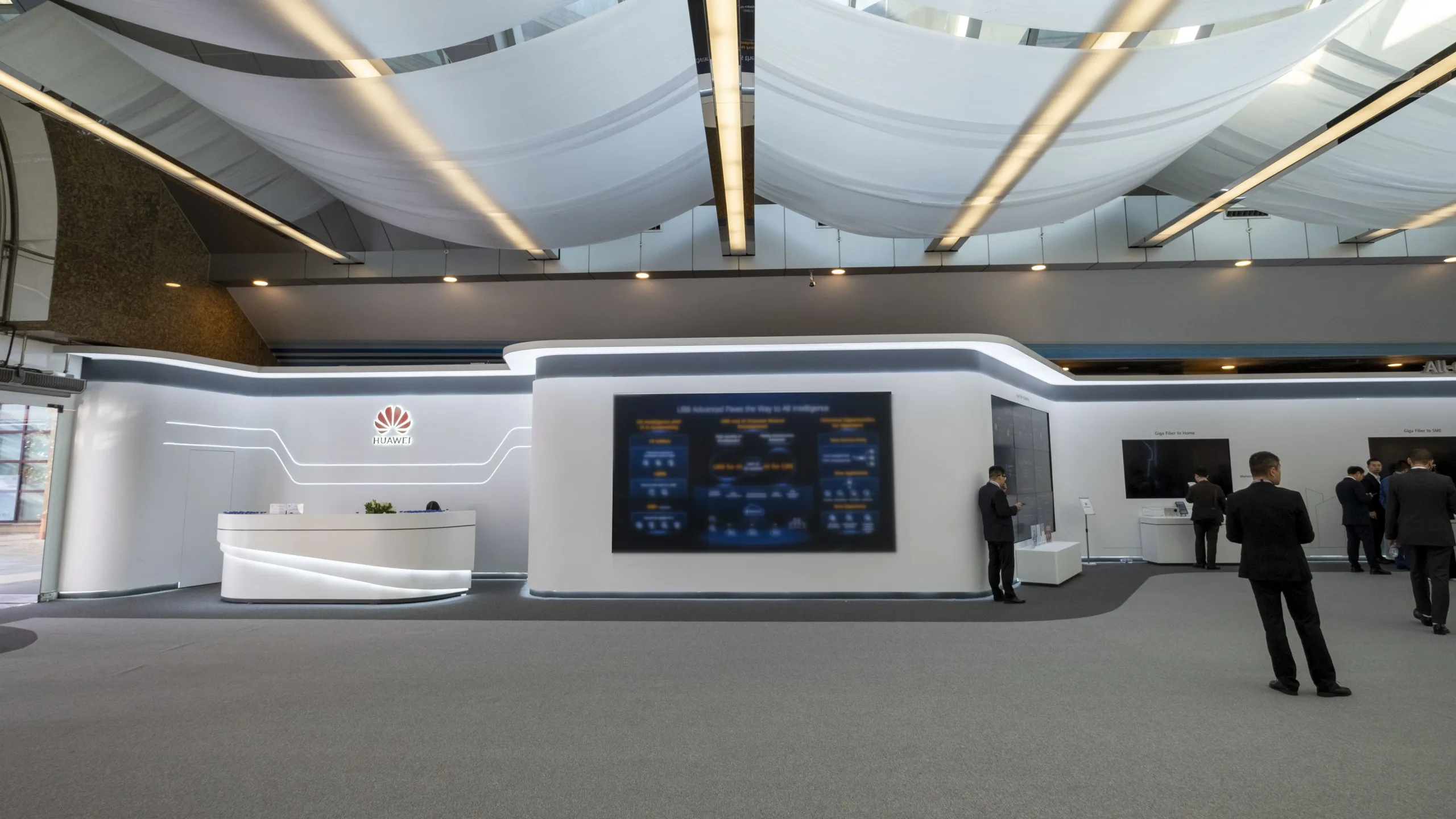 Huawei country pavilion stand design and event management solutions by Gulf Expo Design Huawei country pavilion stand for B2B networking and event management at a major exhibition